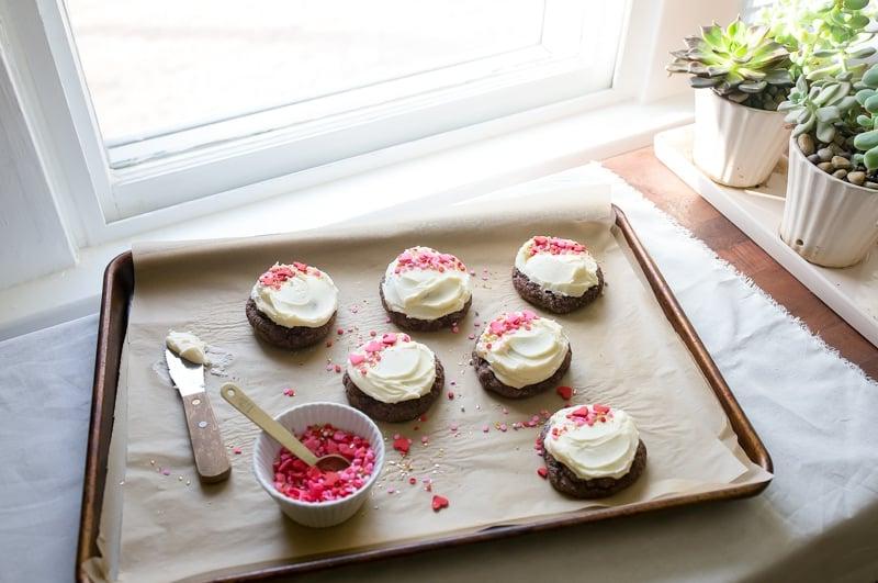 Frosted Chocolate Cookie with Valentine's Day sprinkles. Small batch cookies for two for Valentine's Day