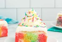 Vibrant Rainbow Poke Cake
