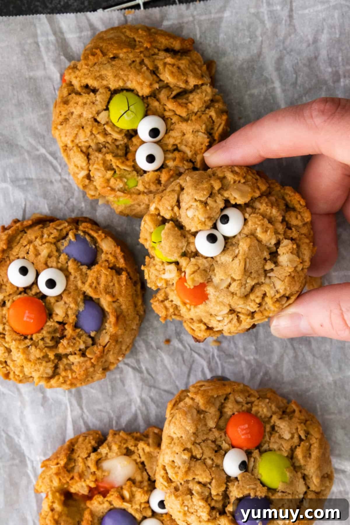 Spooktacular Monster Cookies 2 Halloween monster cookies on parchment.