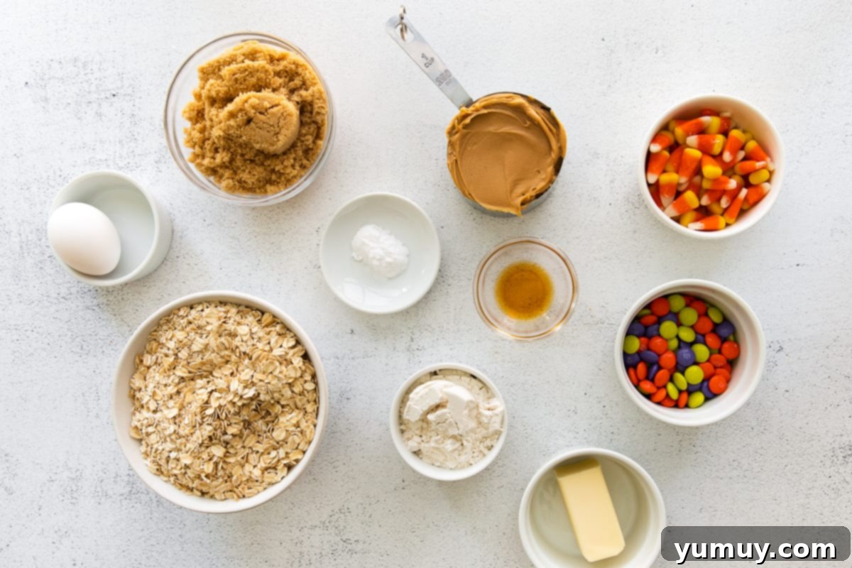 Spooktacular Monster Cookies 10 Ingredients for Halloween monster cookies organized in bowls.