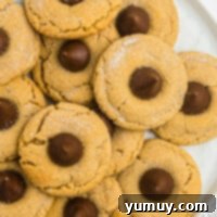 up close platter of peanut butter kiss cookies on marble