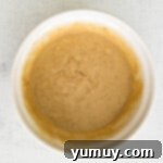 Pecan pie cupcake batter after mixing in a white bowl