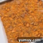 Butterfinger Bliss Fudge 9 Fully set Butterfinger fudge in the baking pan, ready for slicing