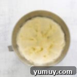 Classic Vanilla Pound Cake 6 creamed butter and sugar in a stainless mixing bowl.