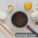 Velvet Raisin Bliss 6 Raisins boiling in water in a saucepan.