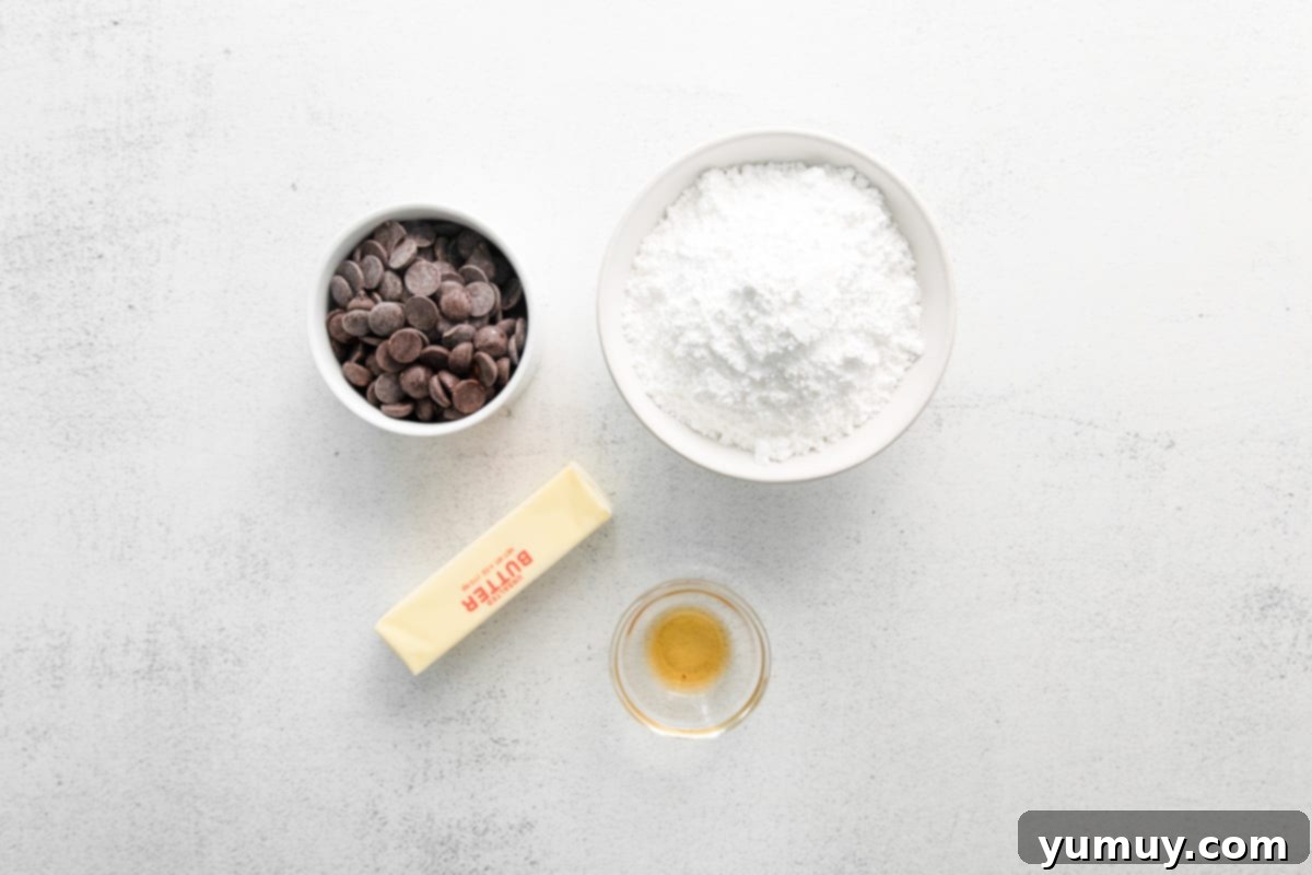 Overhead view of perfectly softened unsalted butter in a stand mixer bowl, poised to be whipped into the luscious chocolate pumpkin cupcake frosting.