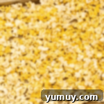 Golden Caramel Crunch 6 popcorn on a baking sheet.