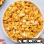 Golden Caramel Crunch 10 overhead view of a bowl off caramel popcorn.