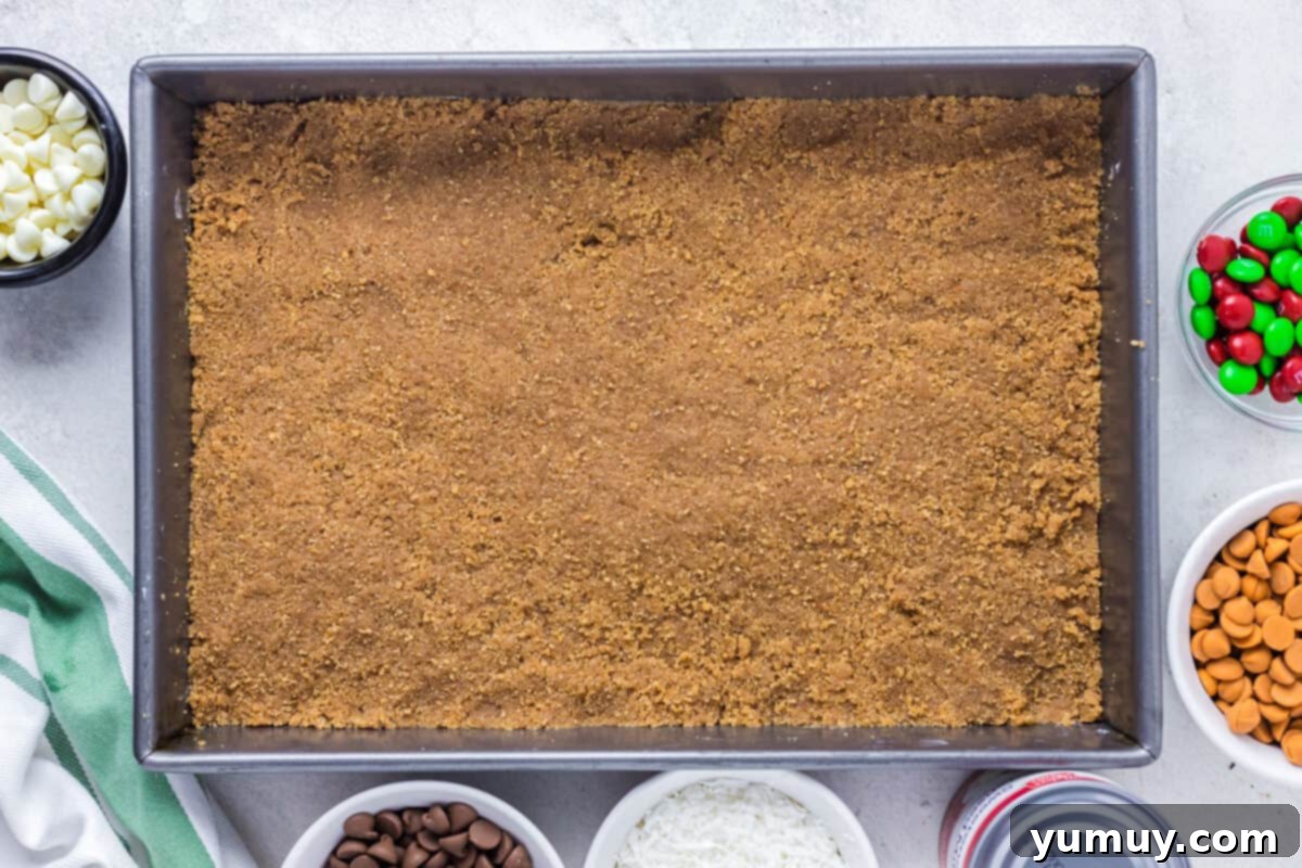 snickerdoodle cookie crust for christmas 7 layer magic cookie bars in a baking pan