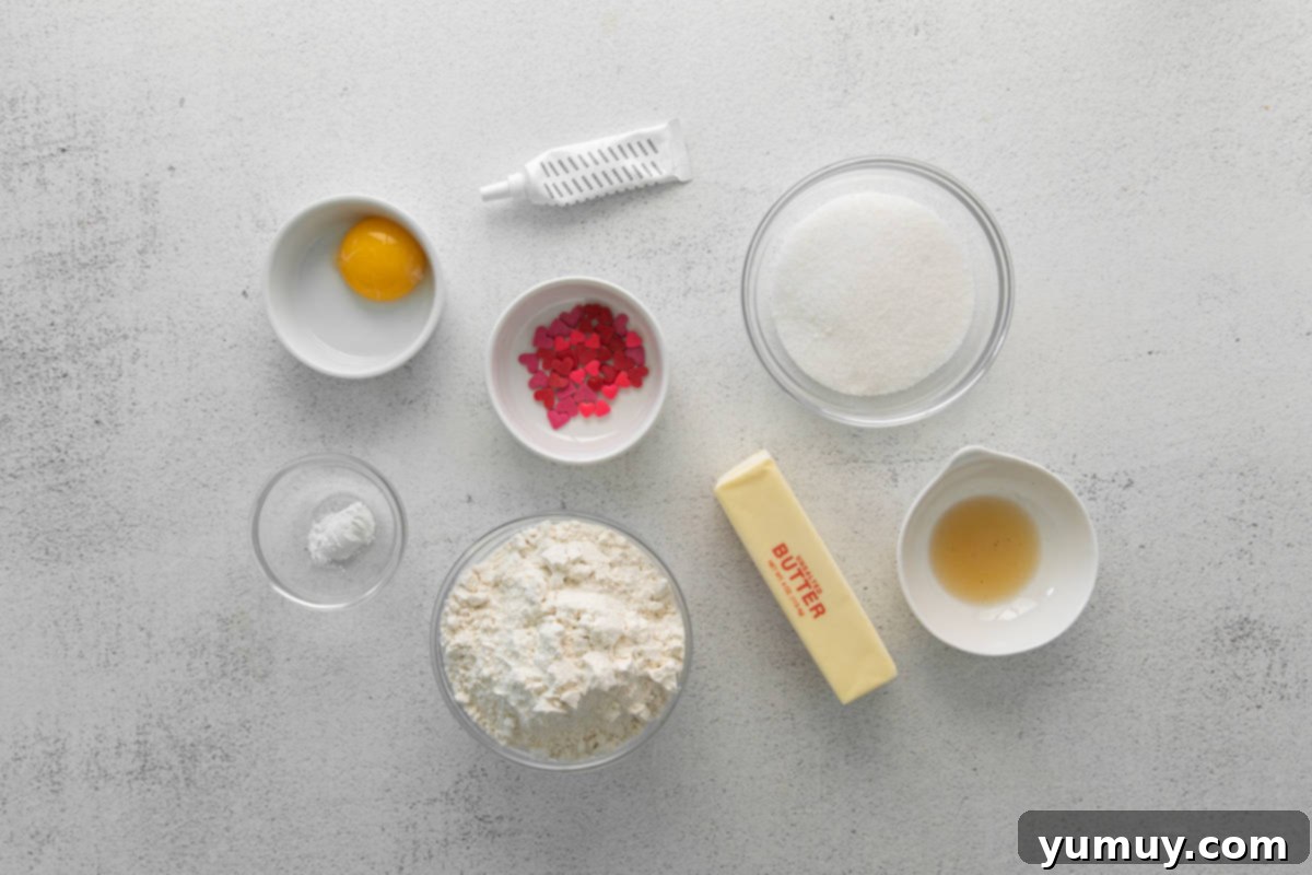 Ingredients for Grinch cookies laid out on a white surface.