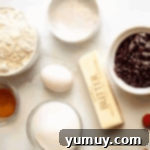 Luscious Raspberry Bars 5 Ingredients for raspberry bars laid out on a counter.