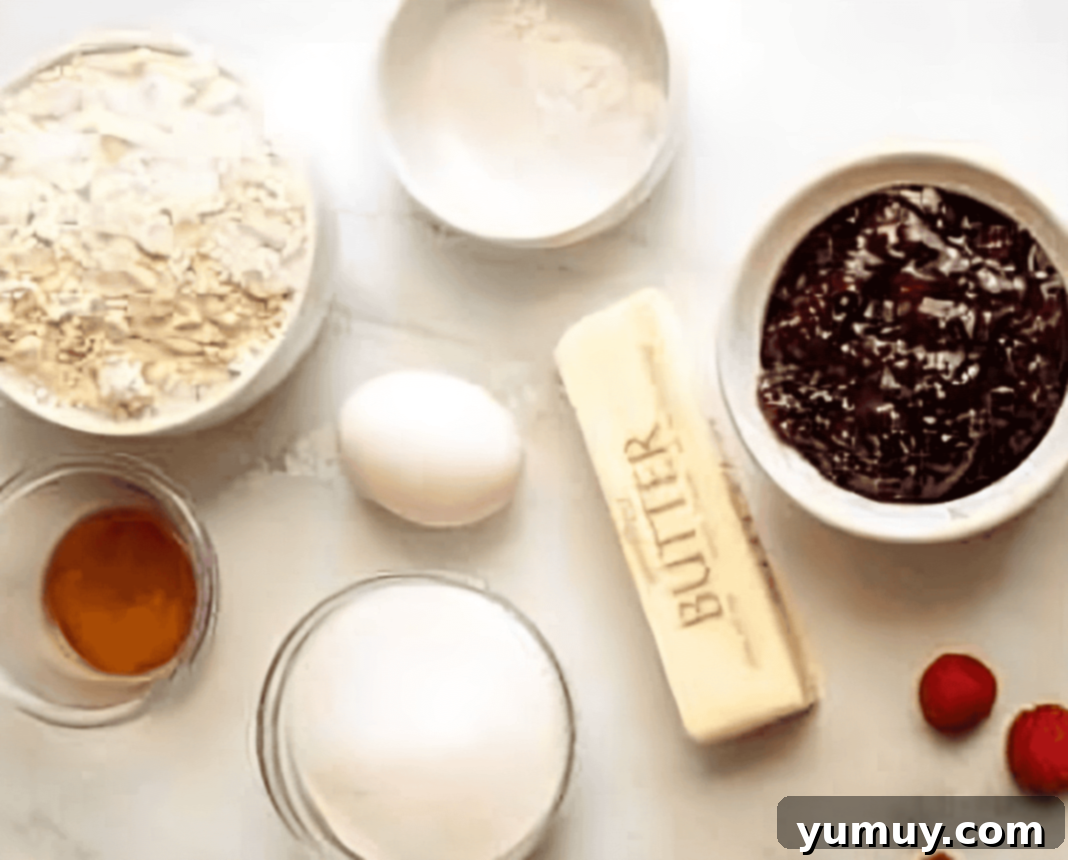 Luscious Raspberry Bars 9 A collection of fresh ingredients for baking raspberry bars, neatly arranged on a kitchen counter.
