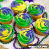 Featured Mardi Gras King Cake Cupcakes with vibrant frosting.