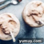 Make Your Own Wendy's Chocolate Frosty at Home 11 overhead image of 2 glasses of chocolate frosty with straws