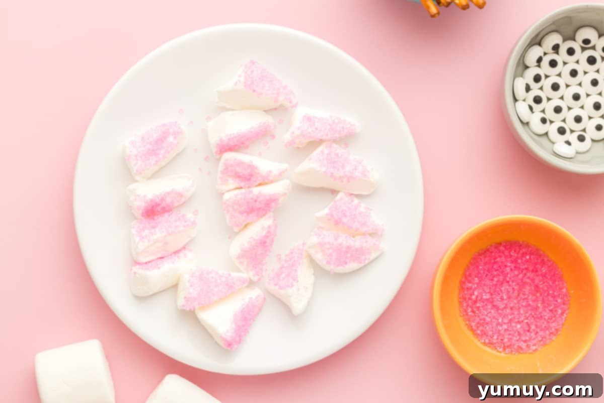marshmallow triangles dipped in pink sanding sugar, resembling bunny ears