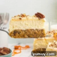 Featured carrot cake cheesecake slice on a white plate