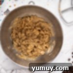 The Legendary Chocolate Chip Cookie Cake 7 creamed butter and sugars in a metal bowl