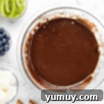 Jeweled Brownie Fruit Tart 6 brownie batter in a glass bowl.