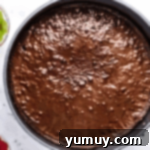 Jeweled Brownie Fruit Tart 8 baked brownies in a round springform pan.