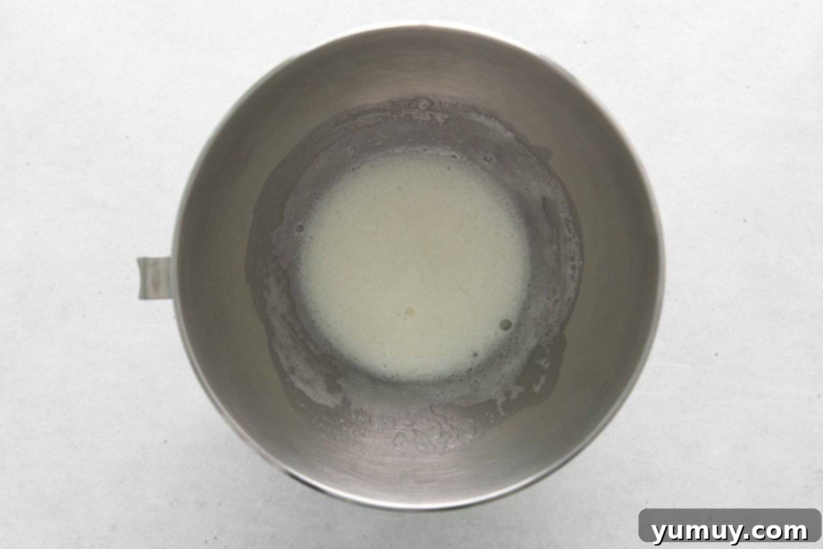 Berry Bliss Macarons 14 egg whites and sugar in a mixing bowl.