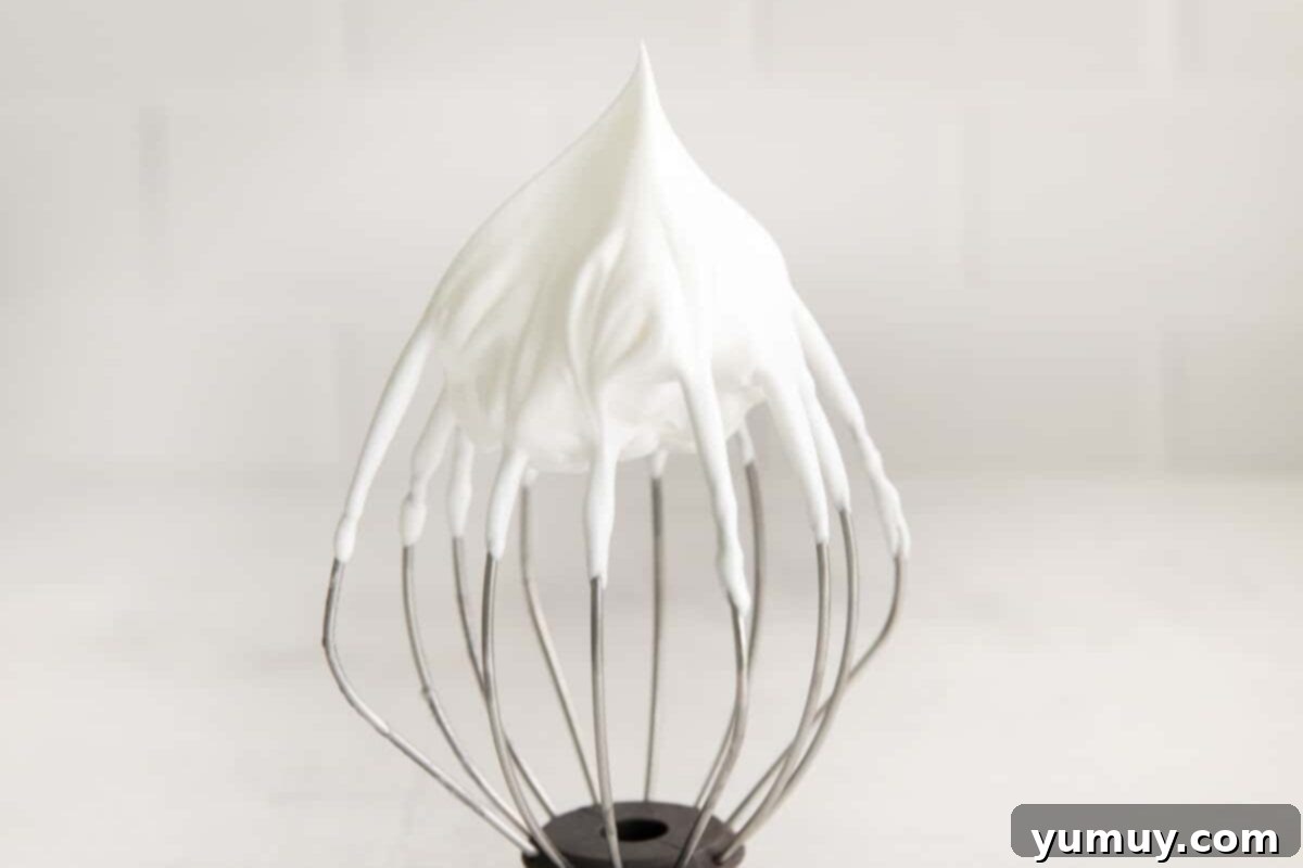 Berry Bliss Macarons 15 egg whites beaten to stiff peaks on a whisk.