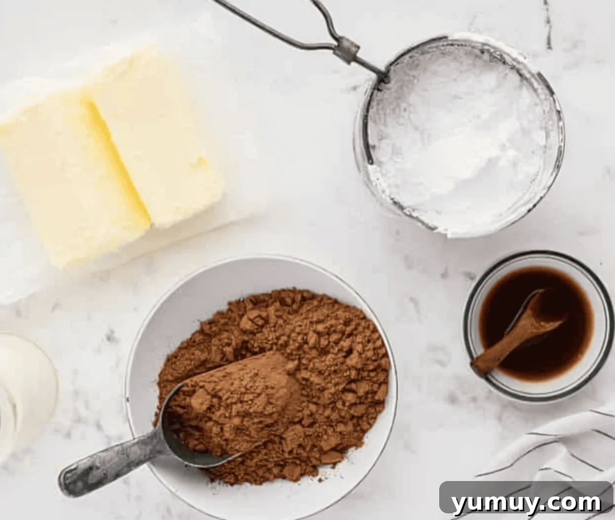 Velvet Chocolate Buttercream 9 ingredients for chocolate buttercream frosting.