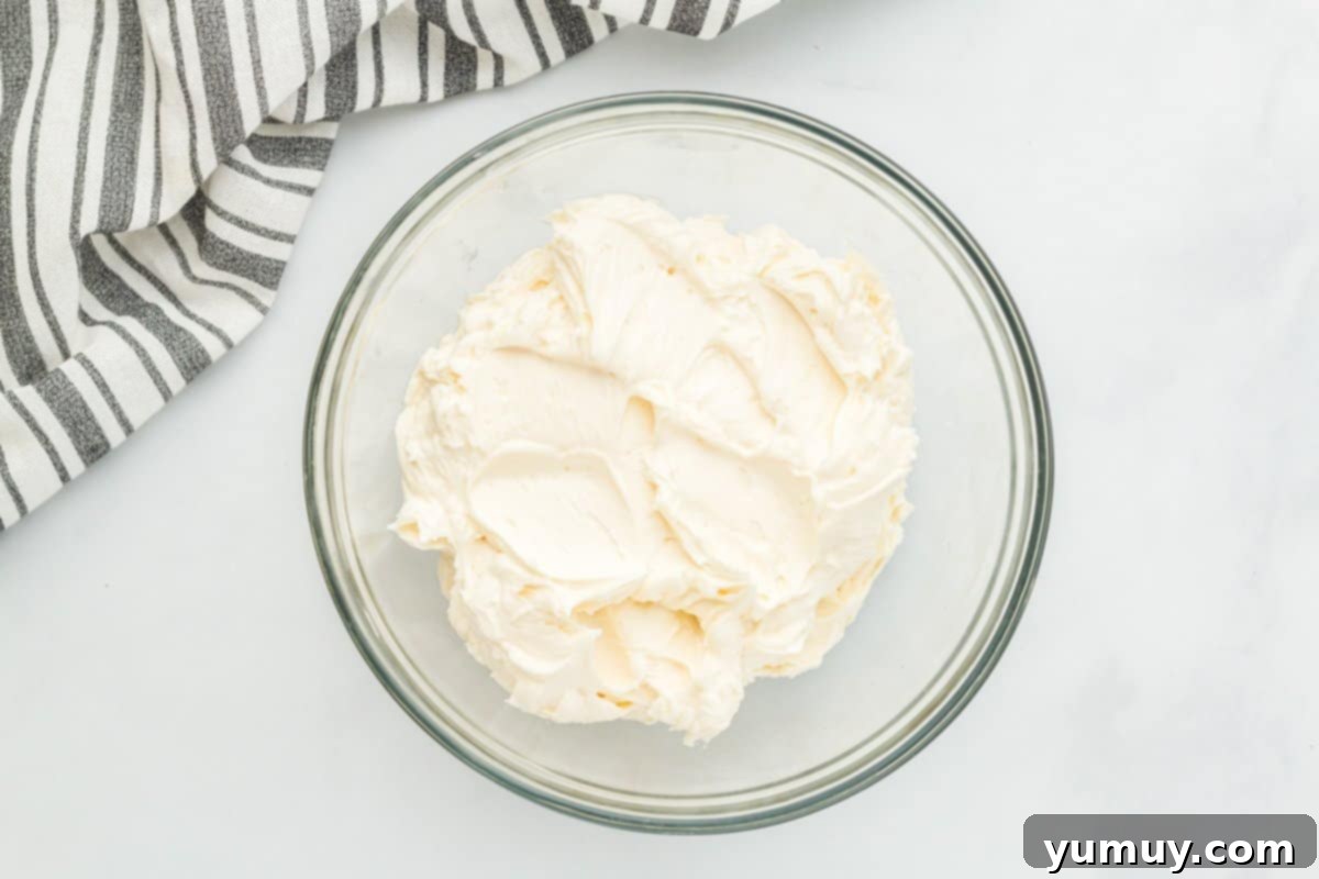 Fathers Day Cookie Creations 15 Smooth, fluffy buttercream frosting beautifully presented in a clear glass bowl.