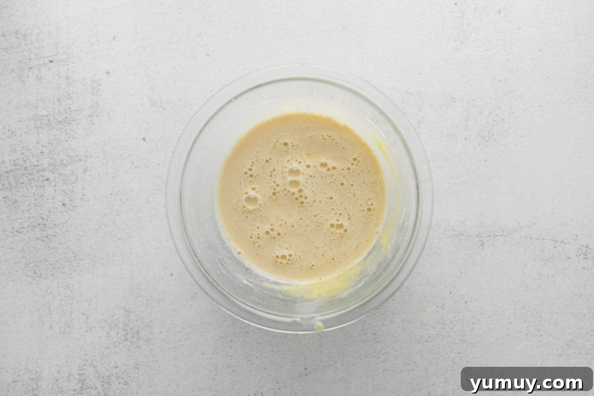 Rich Butterscotch Dream 6 whisked egg mixture in a small glass bowl.