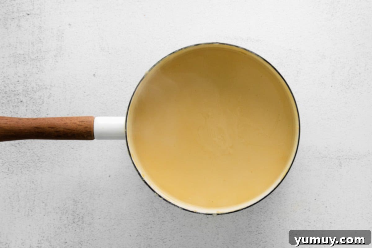 Rich Butterscotch Dream 9 thickened pudding mixture in a pot.