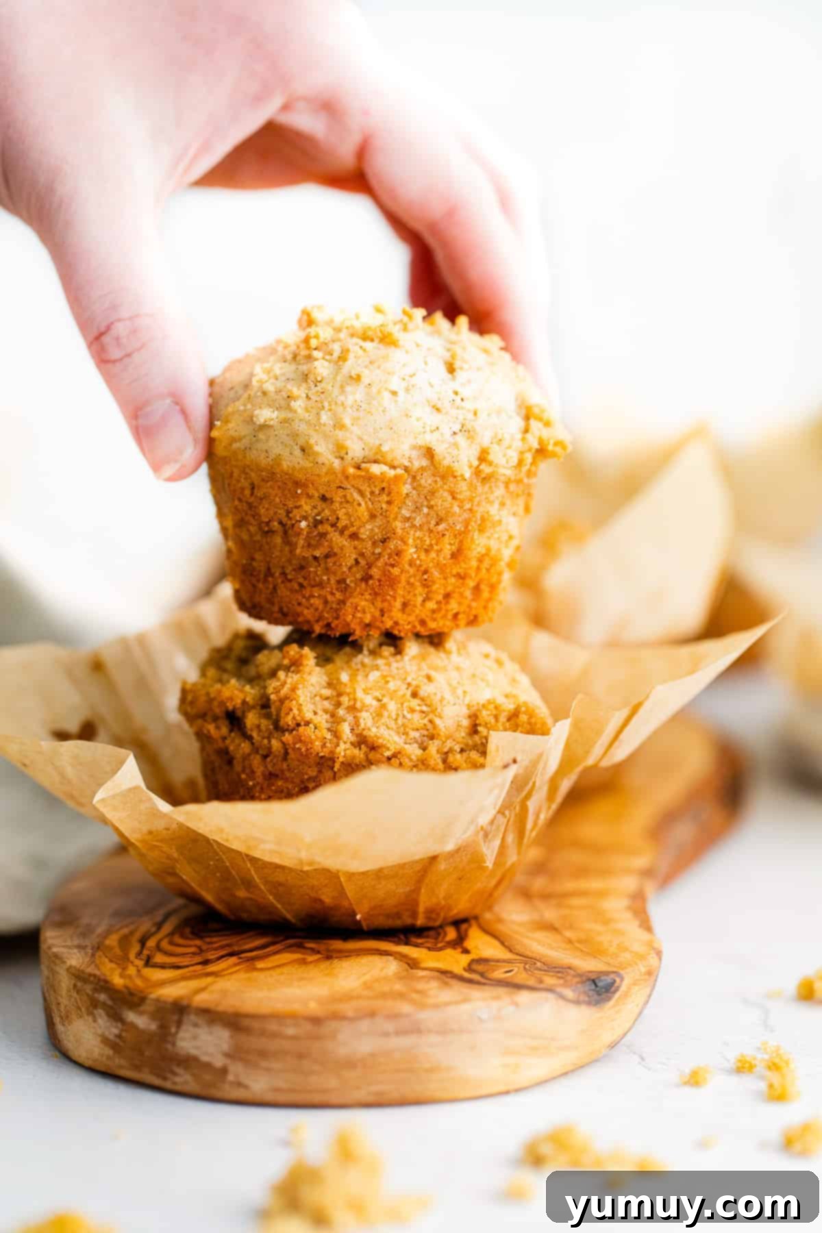 picking up coffee cake muffins