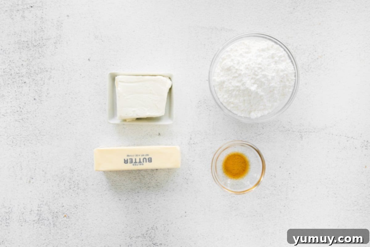 Softened butter and cream cheese, essential for the frosting, in a mixing bowl.