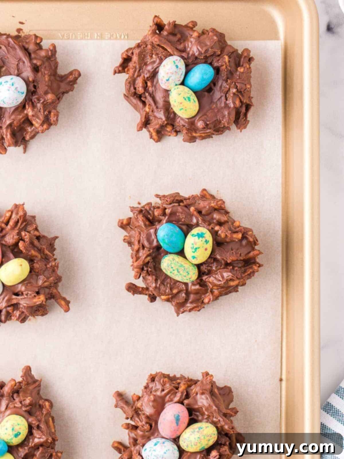 The Baker's 9 Essential Cookie Foundations 14 birds nest cookies on baking sheet