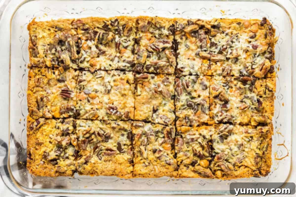 The Baker's 9 Essential Cookie Foundations 6 7 layer magic cookie bars in a baking dish