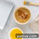 Sweet & Crispy Homemade Greek Baklava 5 Walnuts, cinnamon, and salt in a white bowl, ready for the baklava filling.