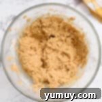 churro cookie dough in a glass bowl.