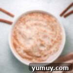 cinnamon sugar mixture for churro french toast in a white bowl.