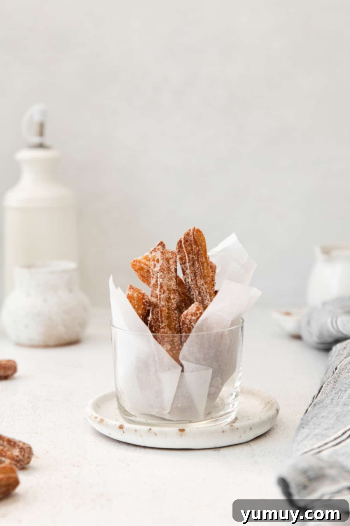 churros in a glass bowl.