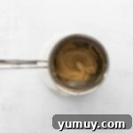 churro dough in a saucepan.