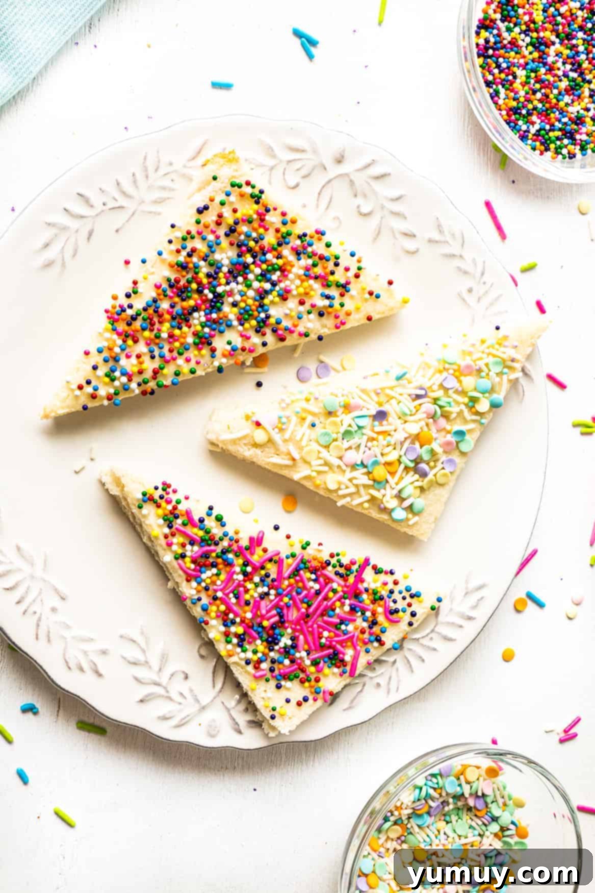 Fairy Bread Double Delight 3 sprinkled fairy bread slices on white plate