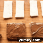 Fairy Bread Double Delight 8 nutella spread on slices of soft white bread.