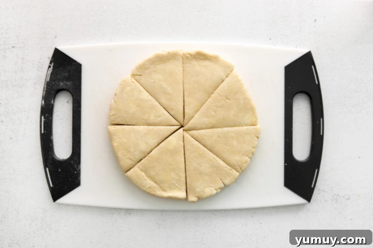 Fluffy Scones from Scratch 14 scone dough cut into eight triangular slices