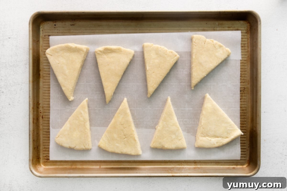 Fluffy Scones from Scratch 15 scone dough lined up on a tray, before baking