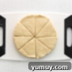 Fluffy Scones from Scratch 8 scone dough cut into eight triangular slices