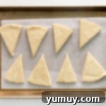 Fluffy Scones from Scratch 9 scone dough lined up on a tray, before baking