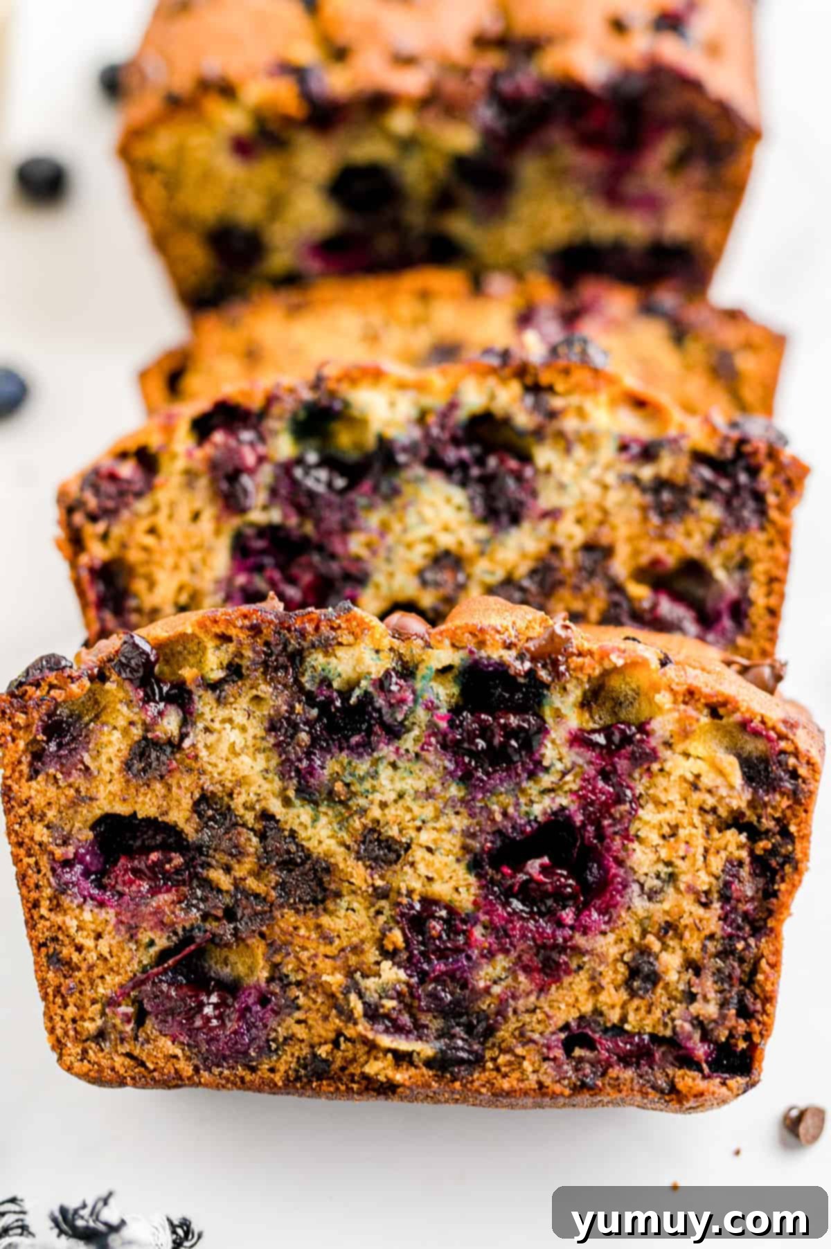 up close slices of chocolate chip blueberry banana bread