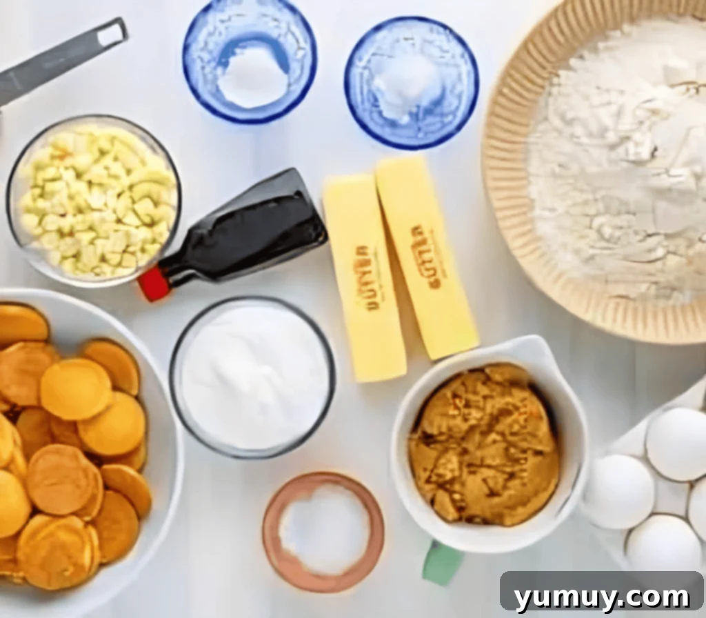 Southern Banana Pudding Cookies 11 All the essential ingredients for banana pudding cookies laid out on a table, including flour, butter, sugar, eggs, and banana pudding mix