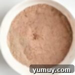 Dry ingredients for chocolate mug cake in a bowl.