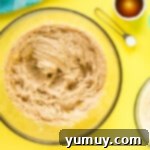 edible chocolate chip cookie dough in a glass bowl.