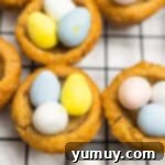 easter basket cookie cups on a wire rack.