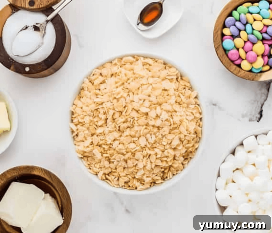 Spring Crispy Delights 5 Ingredients for Easter Rice Krispie Treats laid out on a kitchen counter.